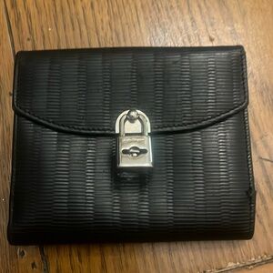 Salvatore ferragamo black wallet with silver lock EUC